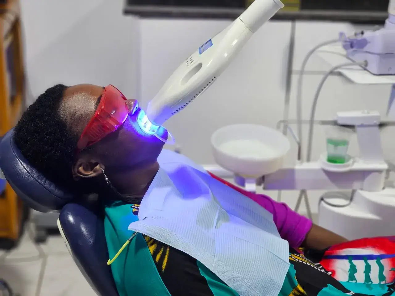 Patient having a teeth whitening procedure